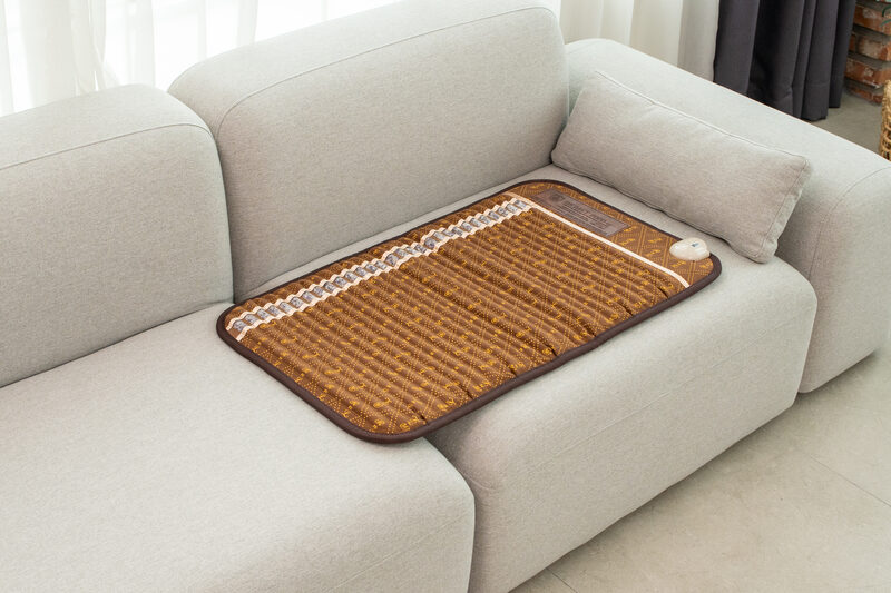 Biomat Mini on couch